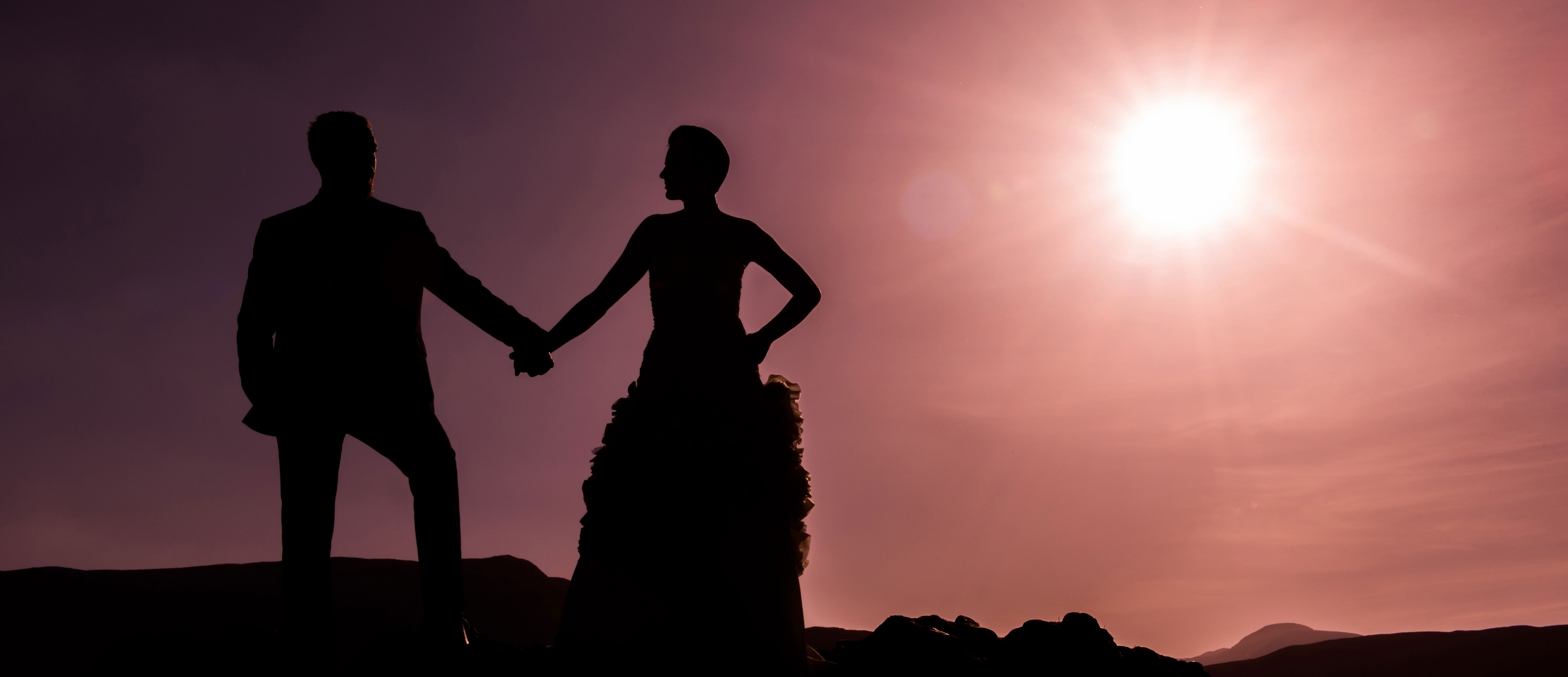 Sheffield wedding photography sunset sky bride and groom holding hands silhouettes
